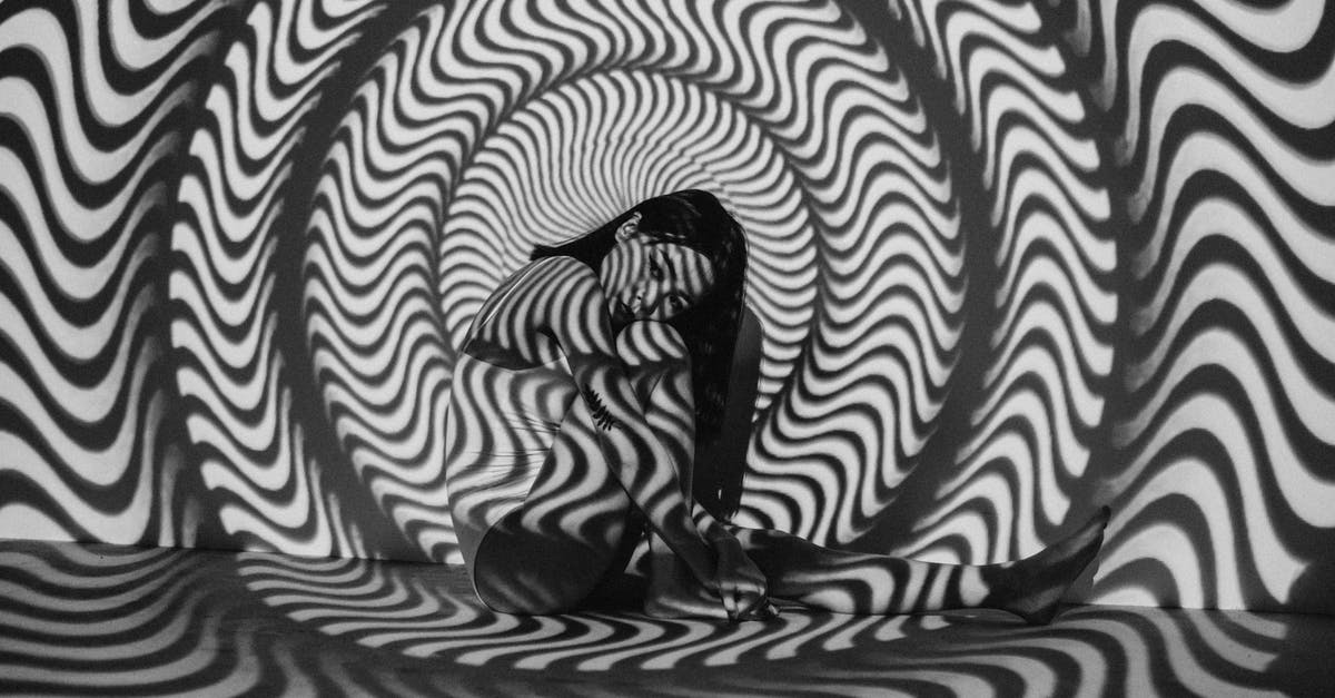 What would be the effect of doubling the egg in this bread? - Woman Sitting Near Black and White Striped Wall What would be the effect of doubling the egg in this bread? - Woman Sitting Near Black and White Striped Wall