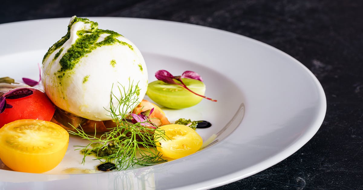 What’s the simplest known Italian vegetable stock recipe? [closed] - Sliced Fruit on White Ceramic Plate