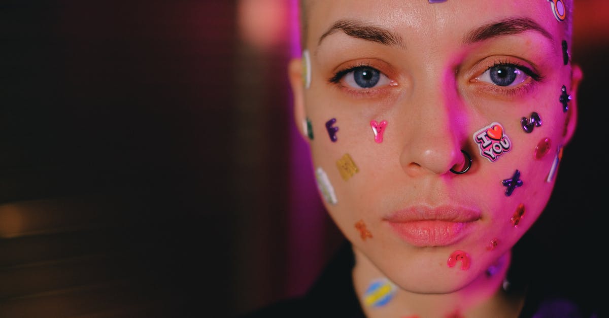 Whats causing odd flavour in reheated chicken? - Crop unemotional woman with stickers on face in dark studio Whats causing odd flavour in reheated chicken? - Crop unemotional woman with stickers on face in dark studio