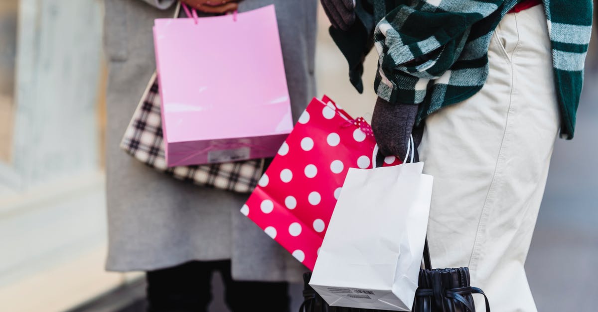 When's the best time to buy a Thanksgiving turkey? - Crop women with purchases on street When's the best time to buy a Thanksgiving turkey? - Crop women with purchases on street