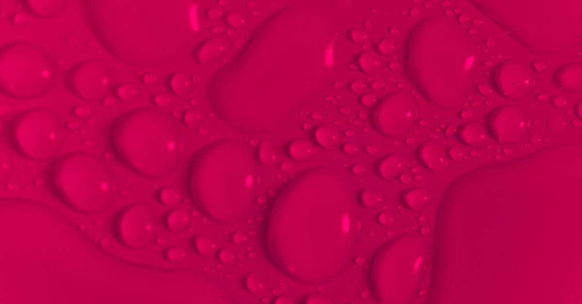 When heating up a pizza, edges burn while middle still liquid - Abstract vinous background with transparent drops When heating up a pizza, edges burn while middle still liquid - Abstract vinous background with transparent drops
