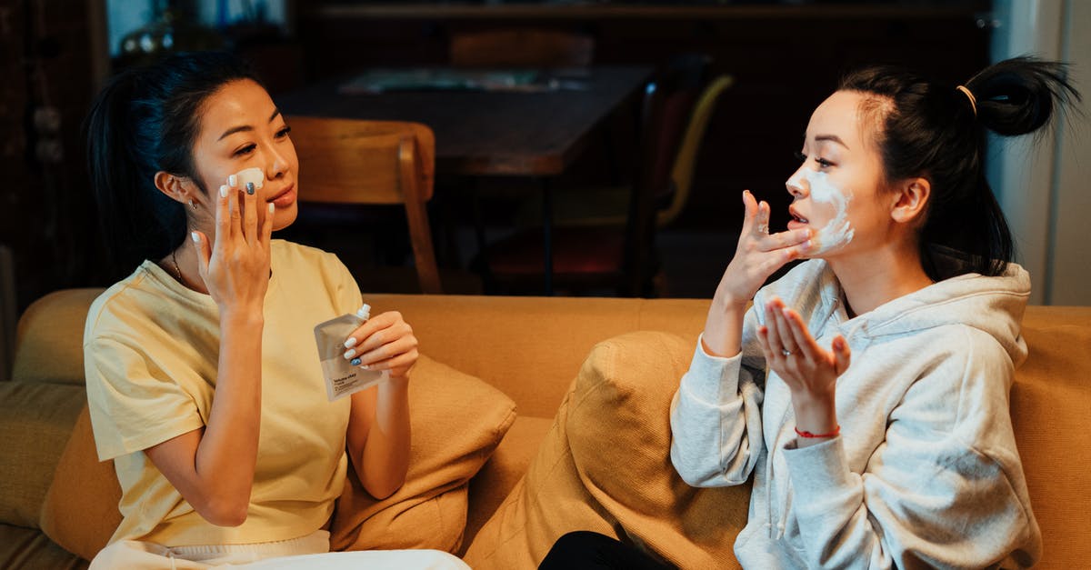 When is homemade wine-based vinegar simply bad wine? - Woman in White Sweater and Black Pants Sitting on Brown Couch