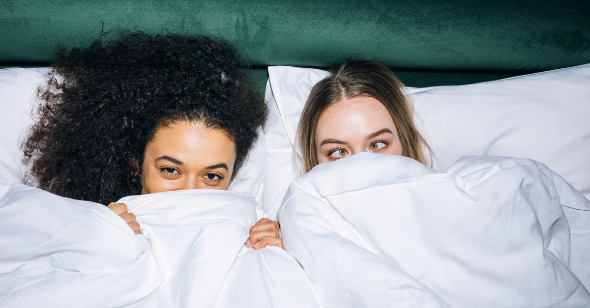 When is the best time to freeze bread? - Two Young Girls Lying on White Bed When is the best time to freeze bread? - Two Young Girls Lying on White Bed