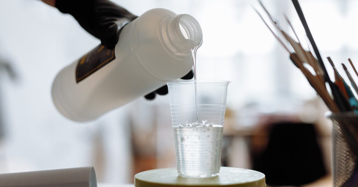 When mixing eggnog with brandy, which is poured first? - Person Pouring Resin in Plastic Cup
