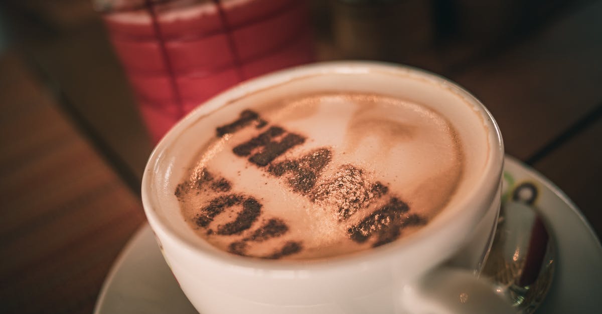 When should I add cocoa powder to instant coffee? - Cup of aromatic cappuccino with Thank You words on foam When should I add cocoa powder to instant coffee? - Cup of aromatic cappuccino with Thank You words on foam