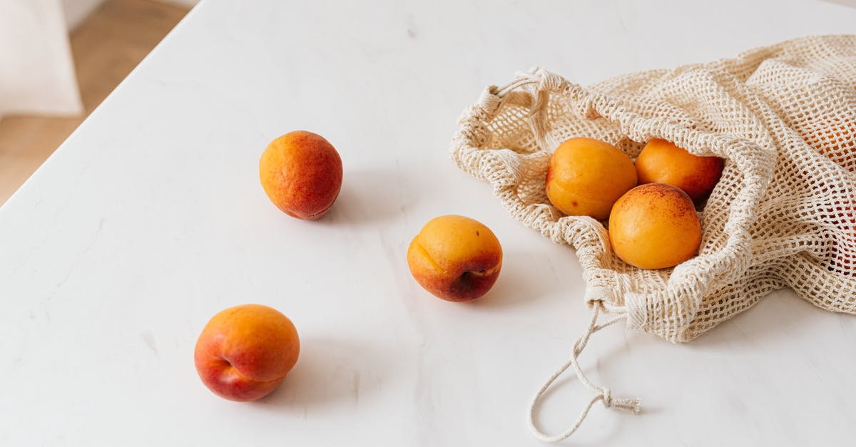 When should you season sauce that needs to be reduced? - Organic sweet apricots in cotton sack placed on table When should you season sauce that needs to be reduced? - Organic sweet apricots in cotton sack placed on table