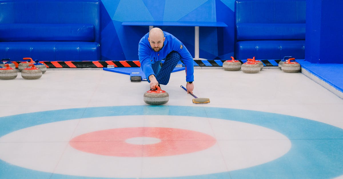 When soaking beans, should I throw away the floating ones? - Focused male in blue activewear choosing tactic and throwing stone while playing curling on ice rink When soaking beans, should I throw away the floating ones? - Focused male in blue activewear choosing tactic and throwing stone while playing curling on ice rink