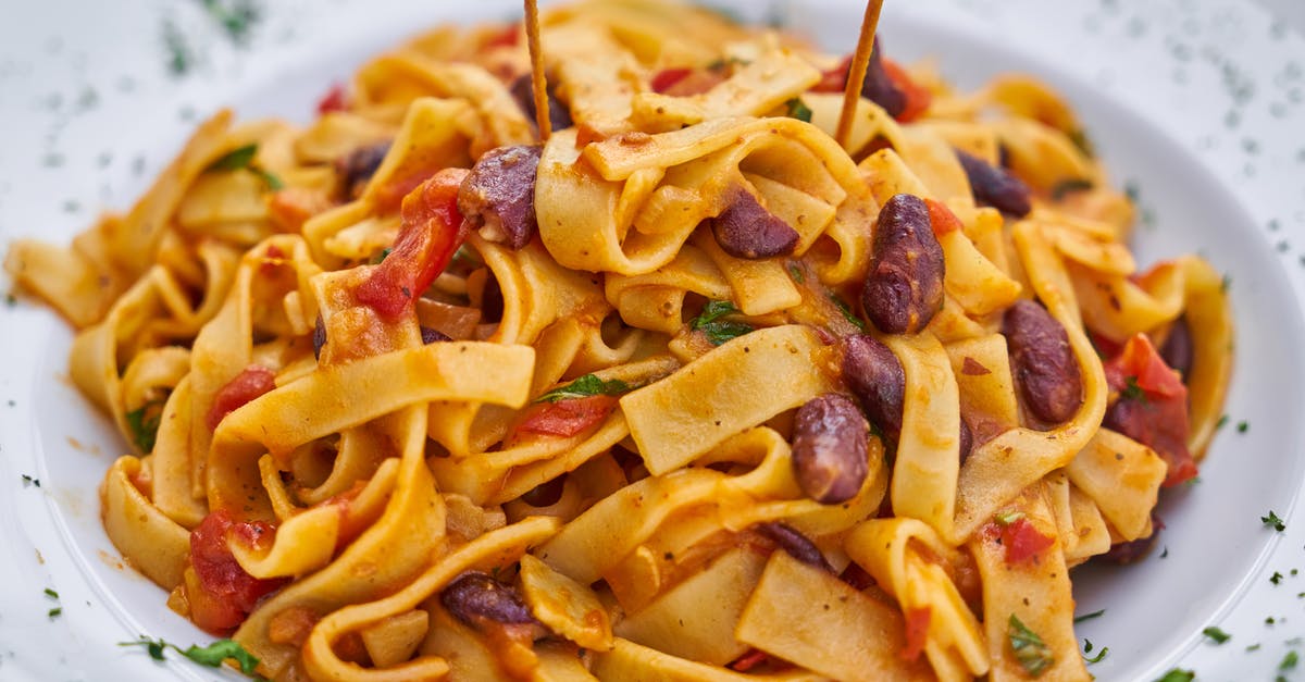 When to add vanilla beans to a sauce? - Pasta on White Plate on Focus Photo When to add vanilla beans to a sauce? - Pasta on White Plate on Focus Photo