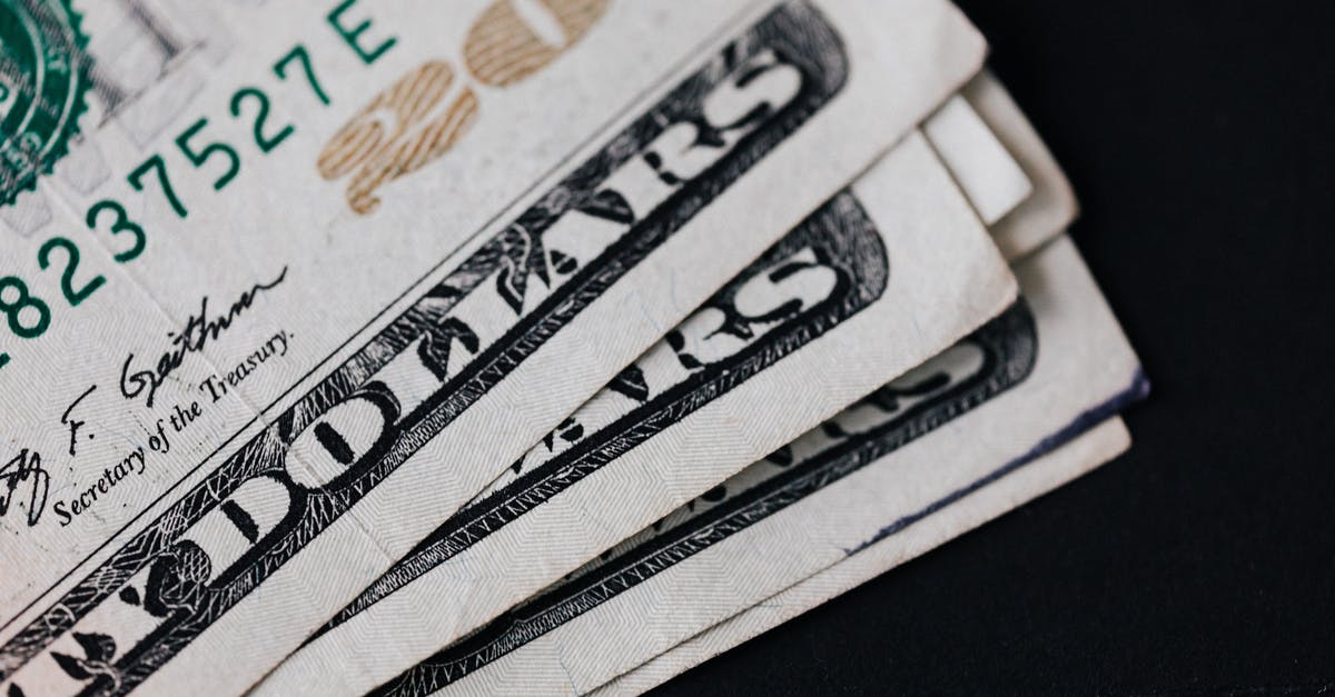 Where can I buy borosilicate (Pyrex) bakeware in the U.S.? - Pile of American paper money on black surface Where can I buy borosilicate (Pyrex) bakeware in the U.S.? - Pile of American paper money on black surface