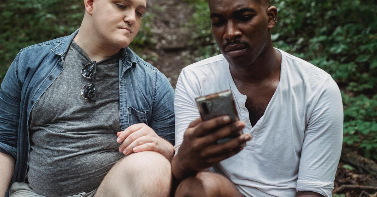 Where can I find yak butter online or in NYC? - Concentrated multiethnic male travelers surfing internet while relaxing in woodland in daytime on blurred background Where can I find yak butter online or in NYC? - Concentrated multiethnic male travelers surfing internet while relaxing in woodland in daytime on blurred background