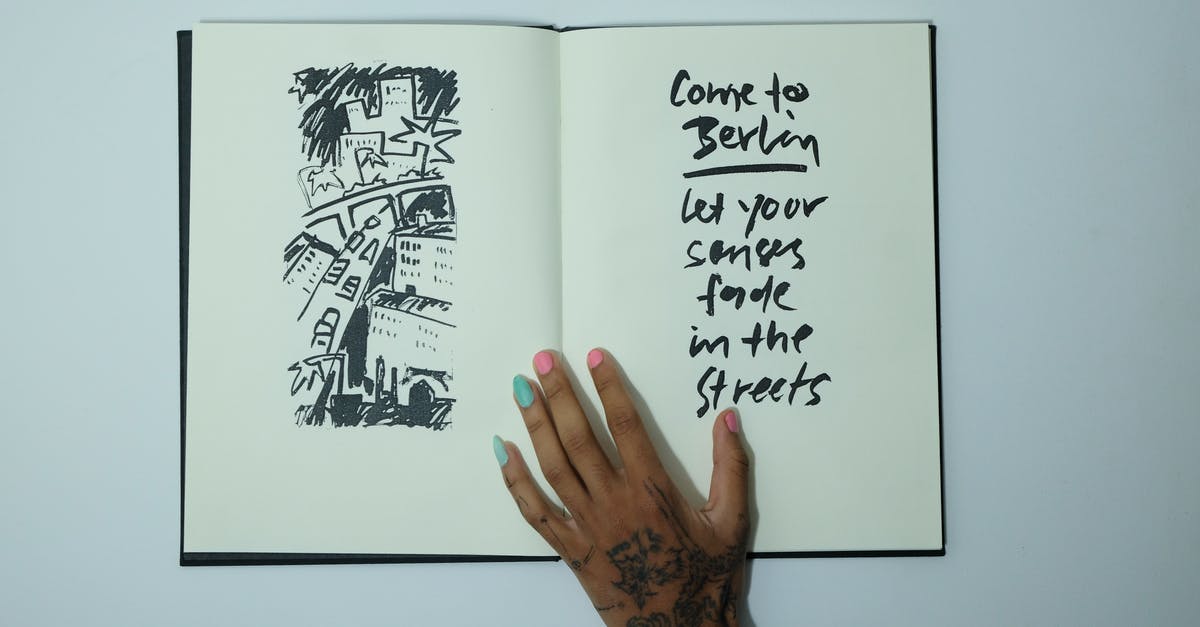 Where did the first kombucha SCOBY come from? - Unrecognizable woman with opened sketchbook with inscription and drawing