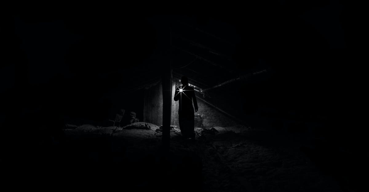Where to find a crepe maker - Low Angle View of Man Standing at Night Where to find a crepe maker - Low Angle View of Man Standing at Night