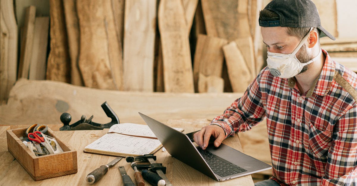 Where to find a crepe maker - Man Using a Laptop at a Wood Workshop Where to find a crepe maker - Man Using a Laptop at a Wood Workshop