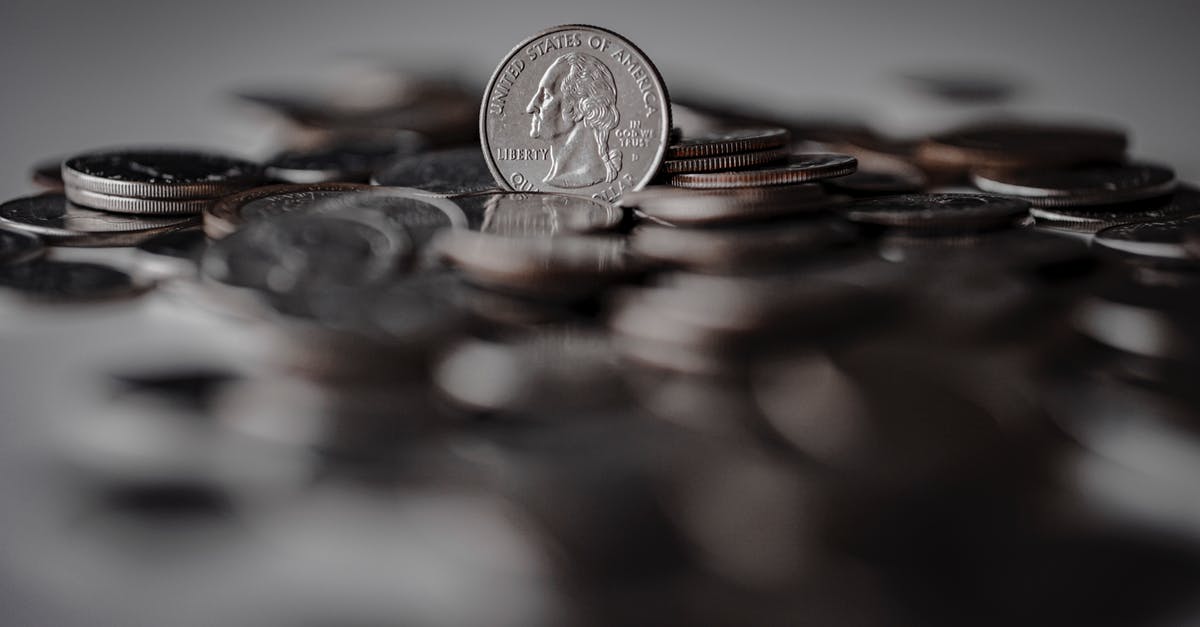 Whey separation making yoghurt: change in proportions - Silver Round Coins on Brown Wooden Surface Whey separation making yoghurt: change in proportions - Silver Round Coins on Brown Wooden Surface