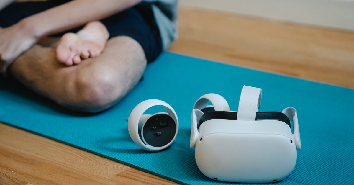 Which cooking device allows flexible temperature programming? - VR glasses on mat near person with crossed leg Which cooking device allows flexible temperature programming? - VR glasses on mat near person with crossed leg