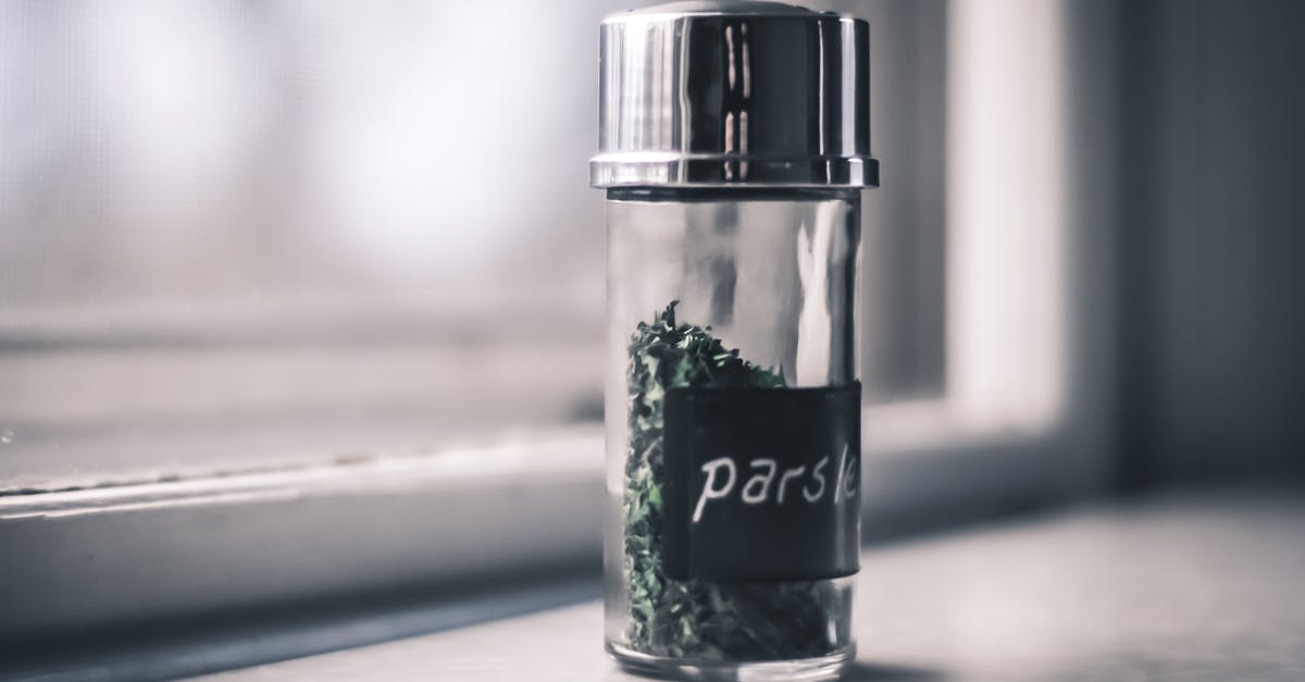 Which kinds of closures for spice and herb containers exist and what are their advantages and disadvantages? - Parsley Shaker Placed on Gray Shelf Which kinds of closures for spice and herb containers exist and what are their advantages and disadvantages? - Parsley Shaker Placed on Gray Shelf