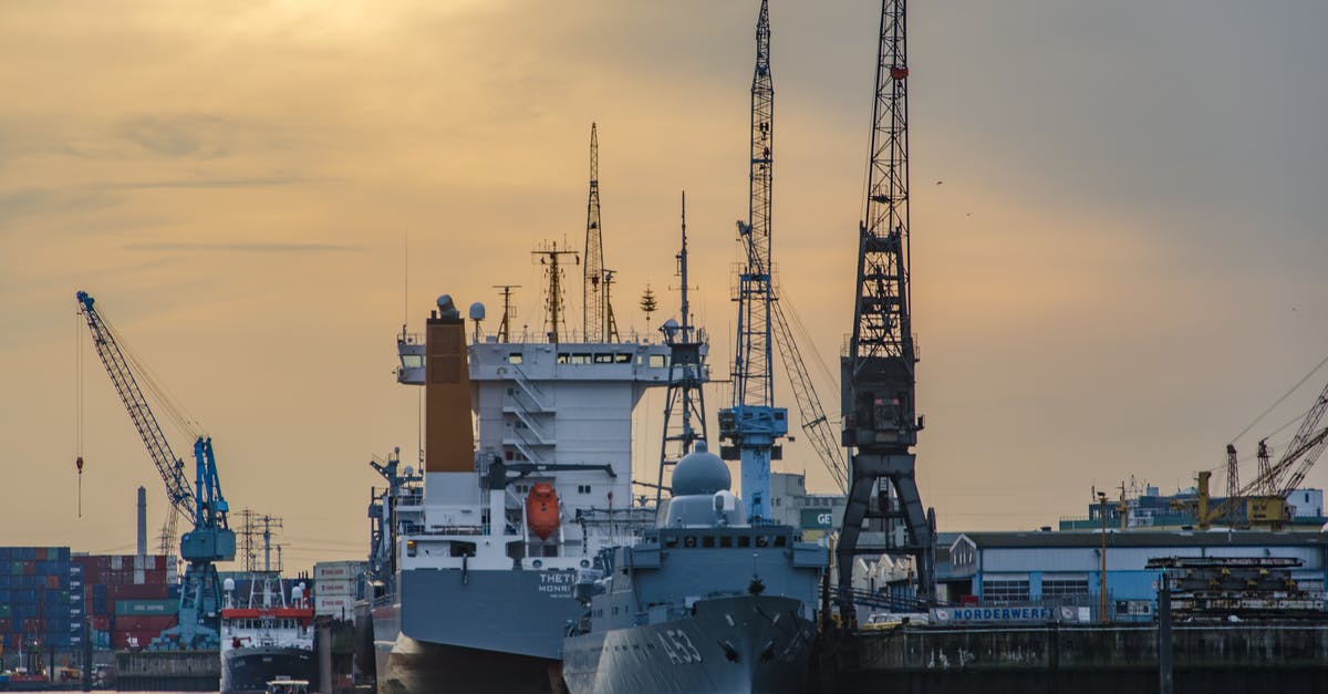 Which kinds of vessels insulate well? - Shipping Boat Near Dock Which kinds of vessels insulate well? - Shipping Boat Near Dock