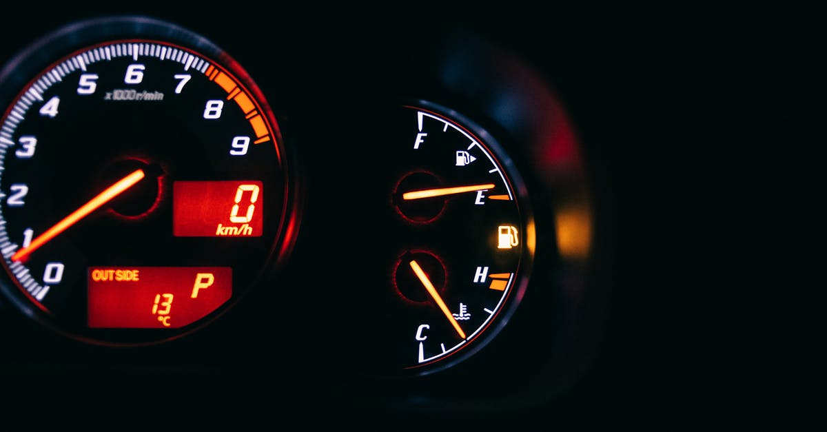 Which measuring scale should I buy? - Modern control and measuring devices with arrows indicating numbers and letters on scales in automobile on black background Which measuring scale should I buy? - Modern control and measuring devices with arrows indicating numbers and letters on scales in automobile on black background