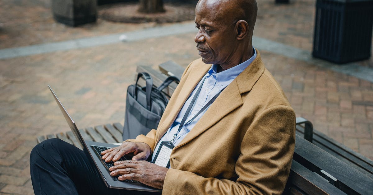 Which types of bread are well suited for overnight proofing and what adjustments are needed? - Focused black businessman typing on laptop in town Which types of bread are well suited for overnight proofing and what adjustments are needed? - Focused black businessman typing on laptop in town