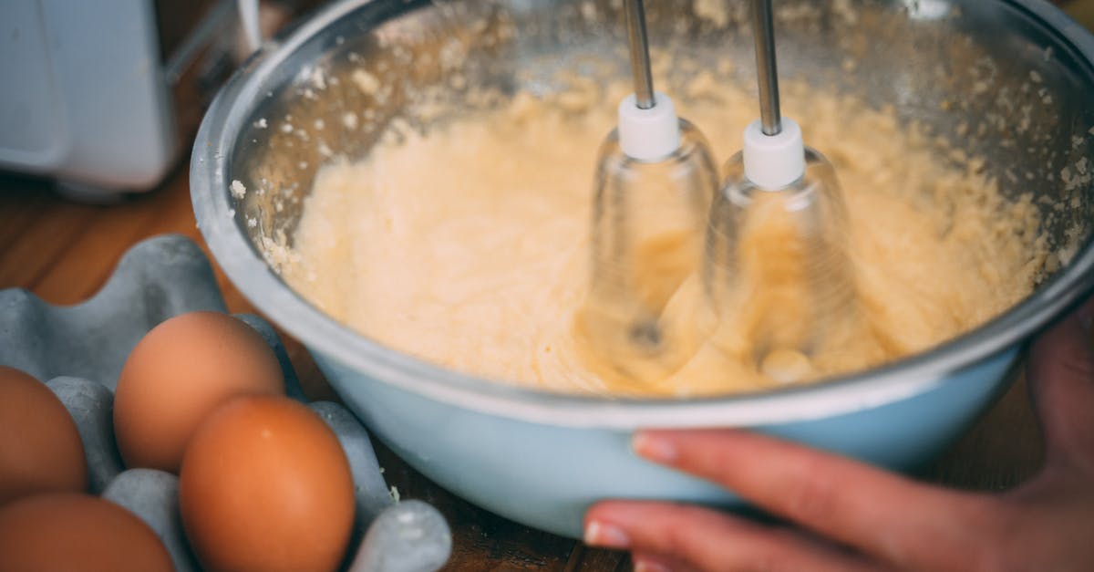 Whisk eggs without an electric whisker - Person Using A Speed Handheld Mixer Whisk eggs without an electric whisker - Person Using A Speed Handheld Mixer