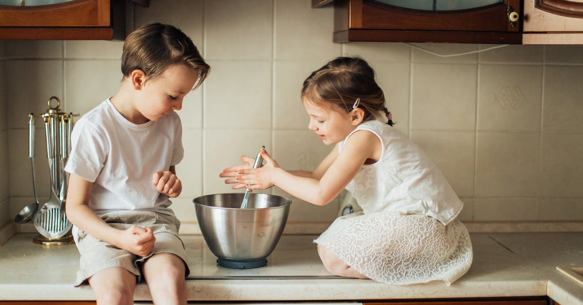 Whisk eggs without an electric whisker - Photo of Kids Playing in Kitchen Counter Top Whisk eggs without an electric whisker - Photo of Kids Playing in Kitchen Counter Top