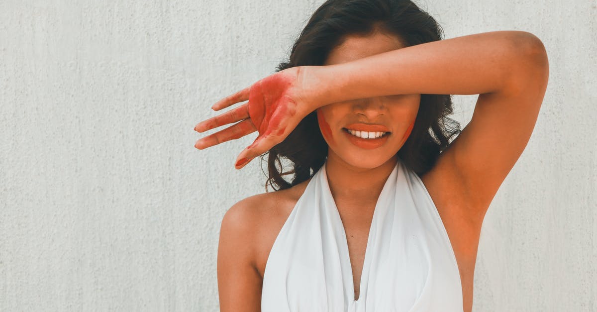 white spots on top of indian pickle - Woman in White Halter Top Covering Eyes with Arm white spots on top of indian pickle - Woman in White Halter Top Covering Eyes with Arm
