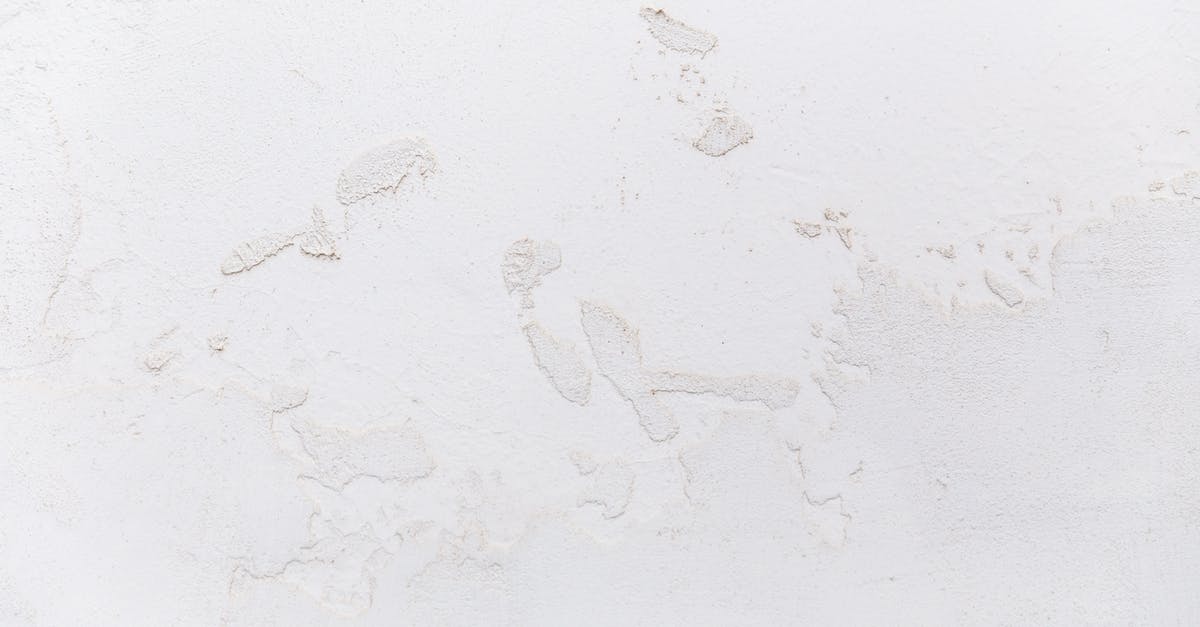 White texture on natto - White shabby concrete wall with cracked stucco White texture on natto - White shabby concrete wall with cracked stucco