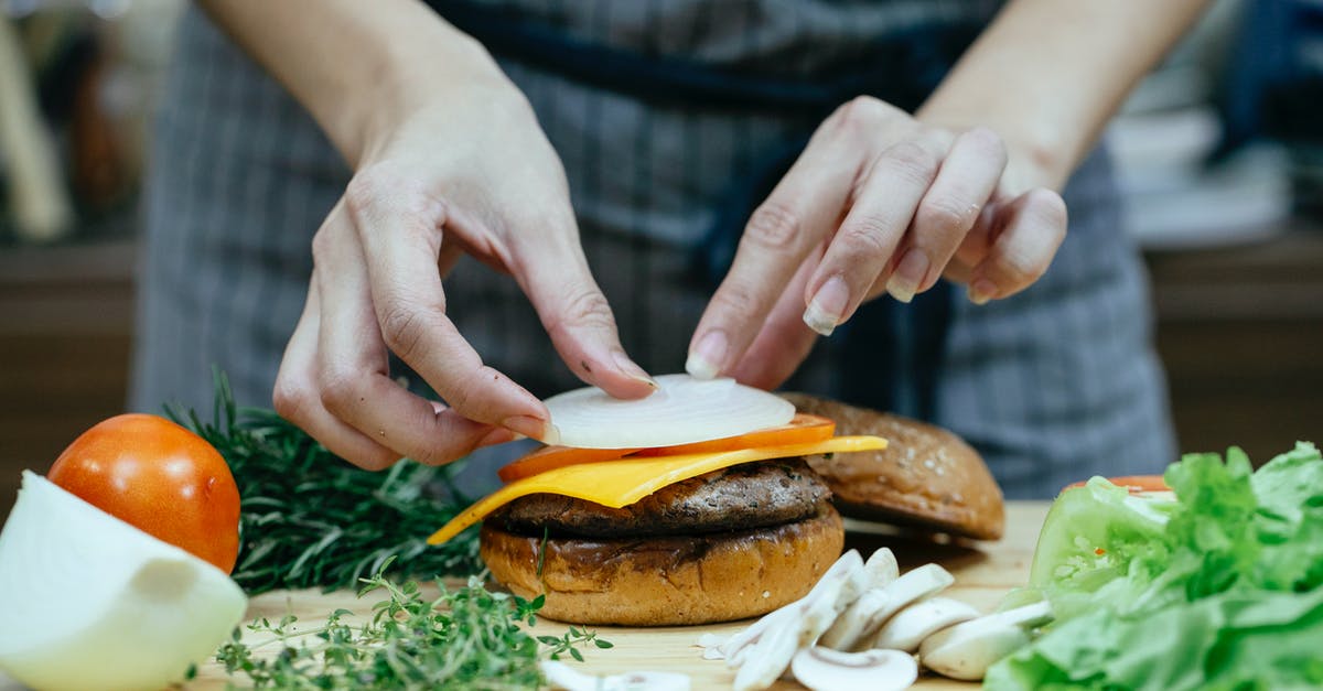 Why add malt to bread? - Crop woman preparing burger in kitchen Why add malt to bread? - Crop woman preparing burger in kitchen