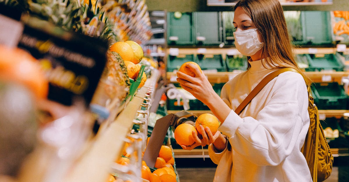 Why are certain fruit & veg bought in UK supermarkets tasteless? - Woman Wearing Mask in Supermarket Why are certain fruit & veg bought in UK supermarkets tasteless? - Woman Wearing Mask in Supermarket