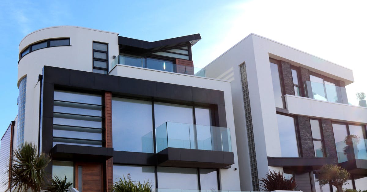 Why are home canning jars made of glass and not metal? - Modern Building Against Sky Why are home canning jars made of glass and not metal? - Modern Building Against Sky