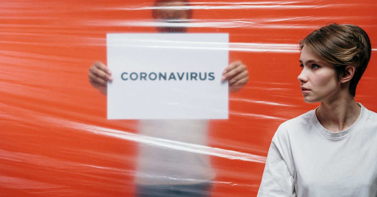 Why are mushrooms safe for everyone to touch at the supermarket? - Man in White Shirt Holding A Sign Of Coronavirus Why are mushrooms safe for everyone to touch at the supermarket? - Man in White Shirt Holding A Sign Of Coronavirus