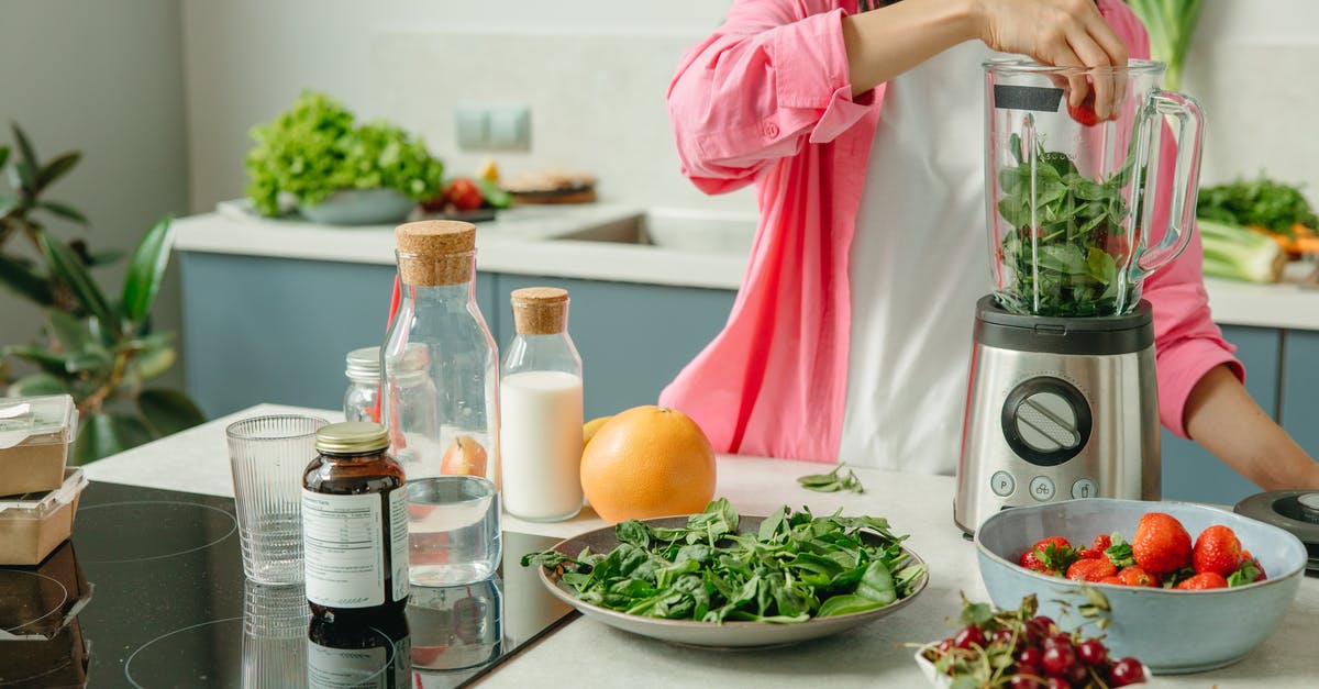 Why are my strawberries keeping so long? - A Woman Putting the Green Leaves and Strawberries in the Blender Why are my strawberries keeping so long? - A Woman Putting the Green Leaves and Strawberries in the Blender