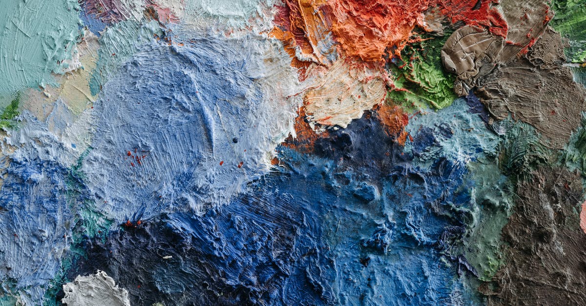 Why are Parathas smeared with fat/oil within layers? - Colorful Paint Smudges on a Flat Surface Why are Parathas smeared with fat/oil within layers? - Colorful Paint Smudges on a Flat Surface