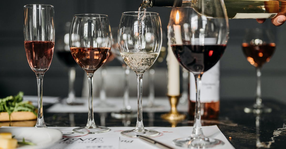 Why are red wine glasses wider than white wine glasses? - Clear Glasses with Wine Why are red wine glasses wider than white wine glasses? - Clear Glasses with Wine