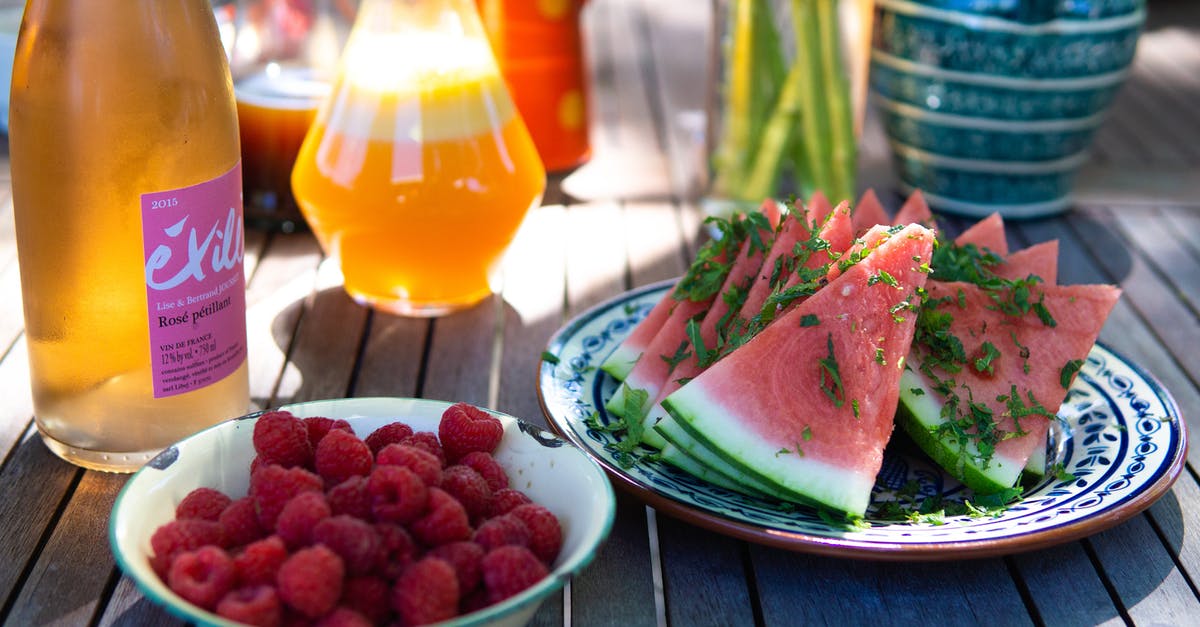 Why are red wine glasses wider than white wine glasses? - Sliced Watermelons on White Plate Why are red wine glasses wider than white wine glasses? - Sliced Watermelons on White Plate