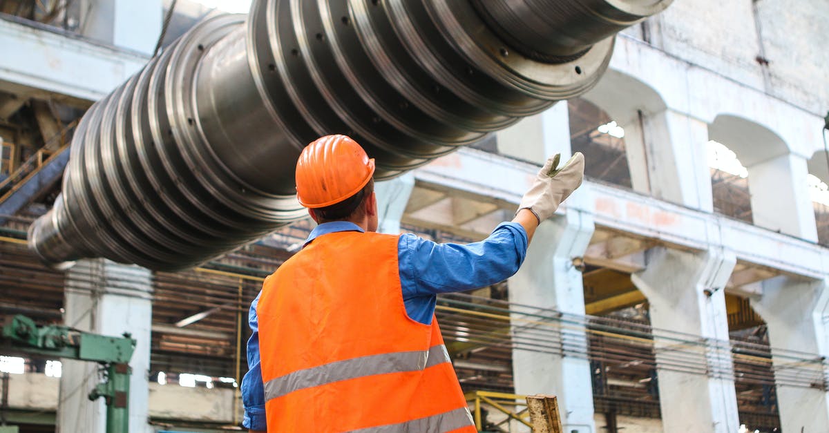 Why are standard cast iron maintenance practices compatible with food safety? - Man Standing Near Gray Metal Equipment Why are standard cast iron maintenance practices compatible with food safety? - Man Standing Near Gray Metal Equipment