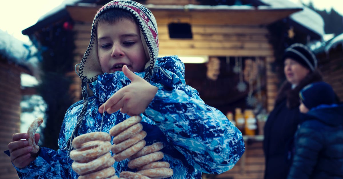 Why are these bagels sticking? - Boy Holding Doughnuts Why are these bagels sticking? - Boy Holding Doughnuts