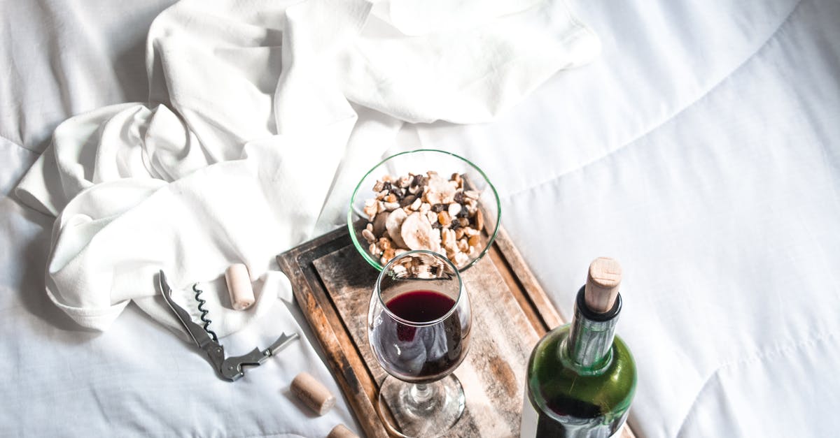 Why boil octopus with wine cork? - Green Glass Bottle Beside Brown Wooden Tray With White Ceramic Mug Why boil octopus with wine cork? - Green Glass Bottle Beside Brown Wooden Tray With White Ceramic Mug