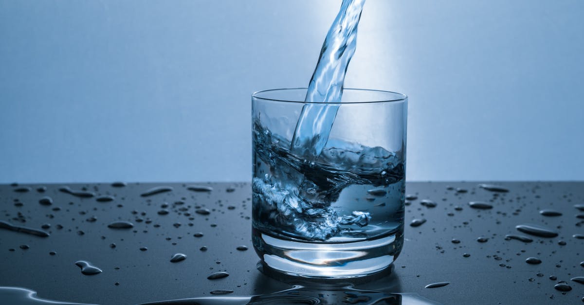 Why clean a pot (used to cook rice) with cold water? - Fluid Pouring in Pint Glass Why clean a pot (used to cook rice) with cold water? - Fluid Pouring in Pint Glass