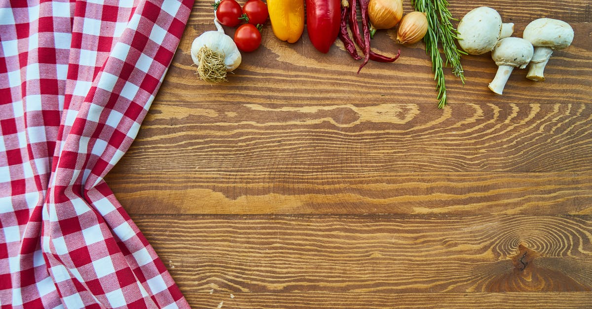Why cook octopus with an onion? - Assorted Spices on Brown Wooden Table Beside Red and White Textile Why cook octopus with an onion? - Assorted Spices on Brown Wooden Table Beside Red and White Textile