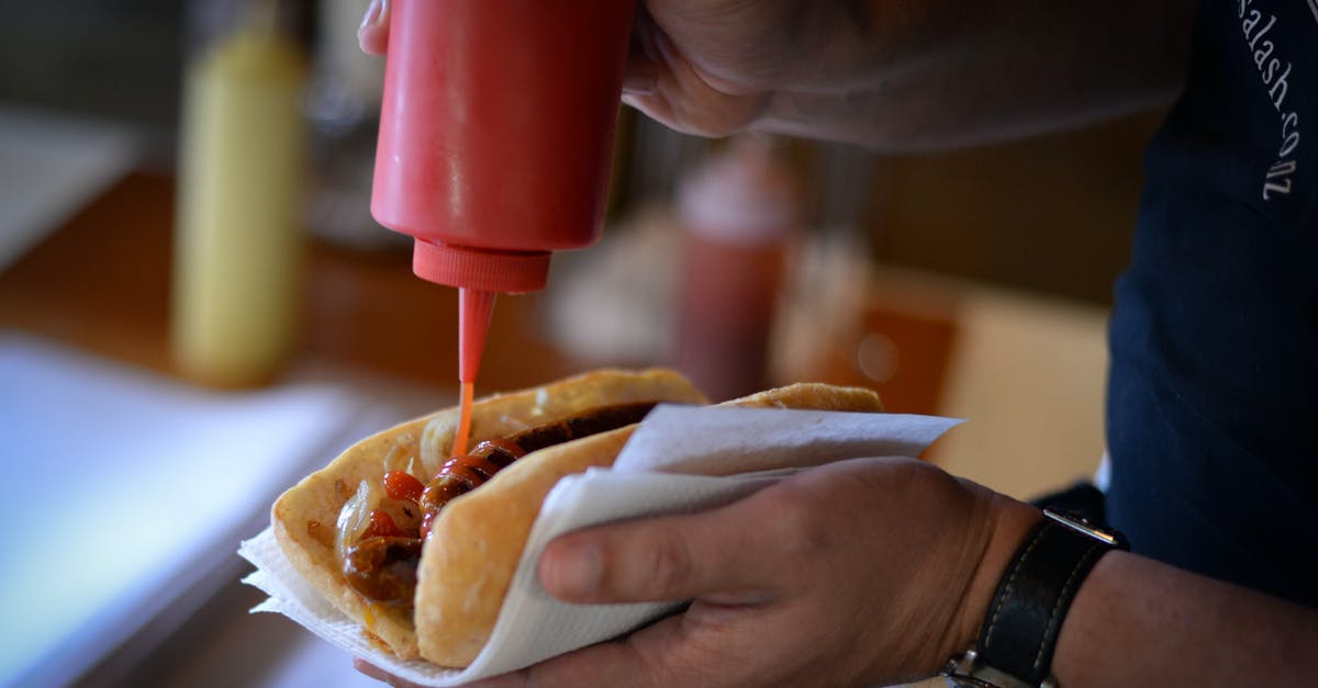 Why cook onion with chicken? Is it just for taste? - Man serving hot dog in fast food cafe Why cook onion with chicken? Is it just for taste? - Man serving hot dog in fast food cafe