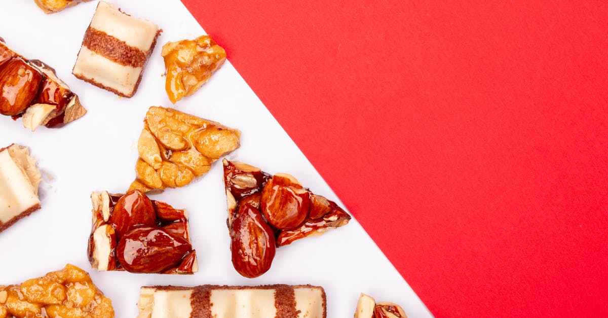 Why did my almonds burn instead of caramelizing? - Assorted Nuts and Kinder Finger on White and Red Surface Why did my almonds burn instead of caramelizing? - Assorted Nuts and Kinder Finger on White and Red Surface
