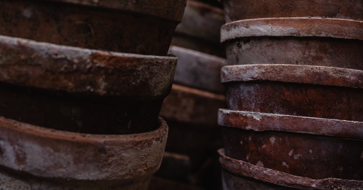 Why did my brown beef stock end up yellow? - Close Up Photo of Pile of Brown Clay Pots Why did my brown beef stock end up yellow? - Close Up Photo of Pile of Brown Clay Pots