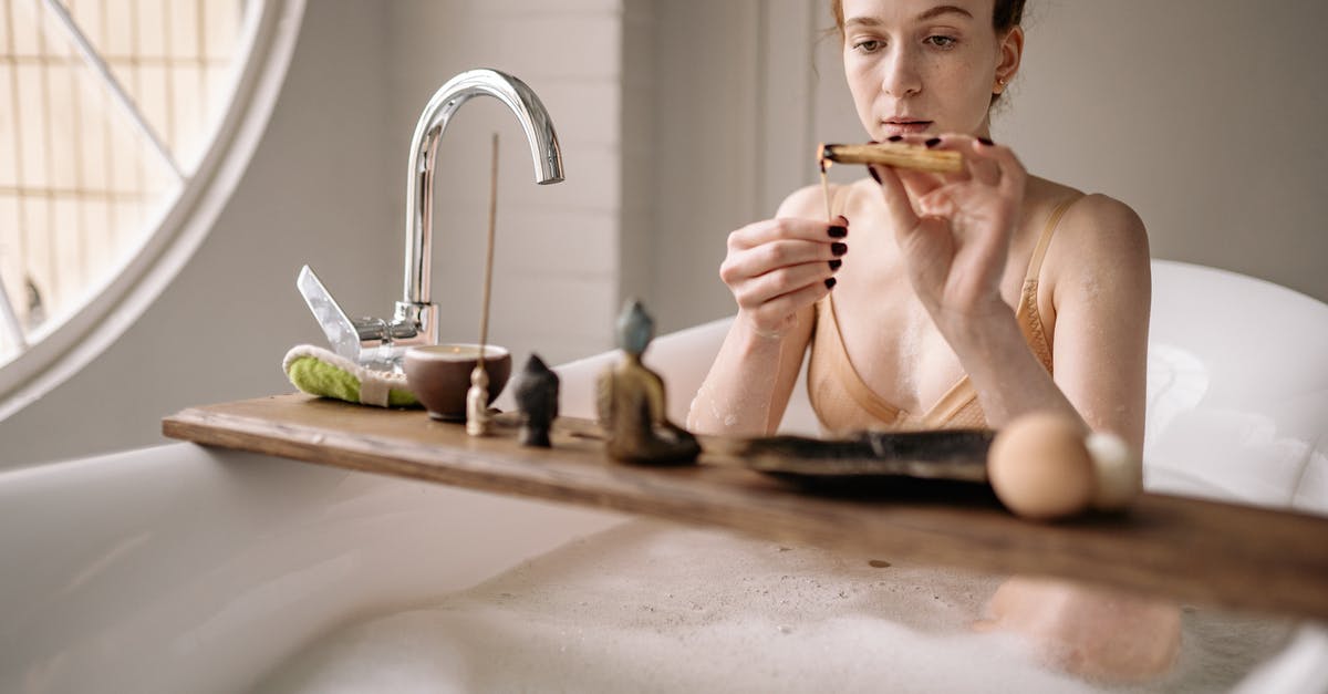 Why did my Chickpea water congeal? - Woman in Bathtub Holding Toothbrush Why did my Chickpea water congeal? - Woman in Bathtub Holding Toothbrush