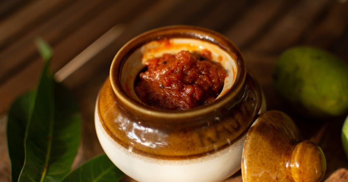 Why did my mango pickle become bitter? - Ceramic Container with Red Paste Why did my mango pickle become bitter? - Ceramic Container with Red Paste