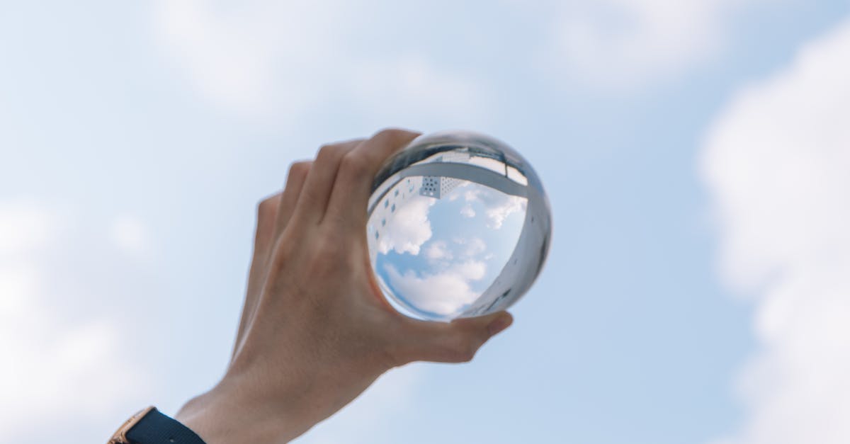 Why did my reverse spherification method fail to produce proper spheres? - Crop male holding glass bulb in hand Why did my reverse spherification method fail to produce proper spheres? - Crop male holding glass bulb in hand