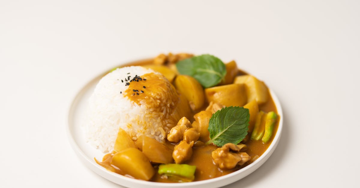 Why did my stew not taste sweet? - Plate of traditional Indian dish curry with rice