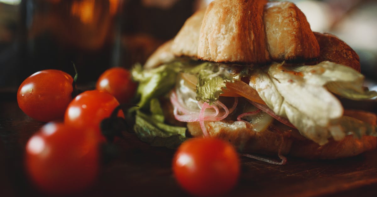 Why did my vegan croissants come out flat? - Crunchy veggie croissant sandwich served on board with tomatoes Why did my vegan croissants come out flat? - Crunchy veggie croissant sandwich served on board with tomatoes