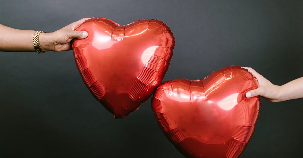 Why did my vinaigrette congeal? - Two Persons Holding Two Red Heart Shaped Balloons Why did my vinaigrette congeal? - Two Persons Holding Two Red Heart Shaped Balloons