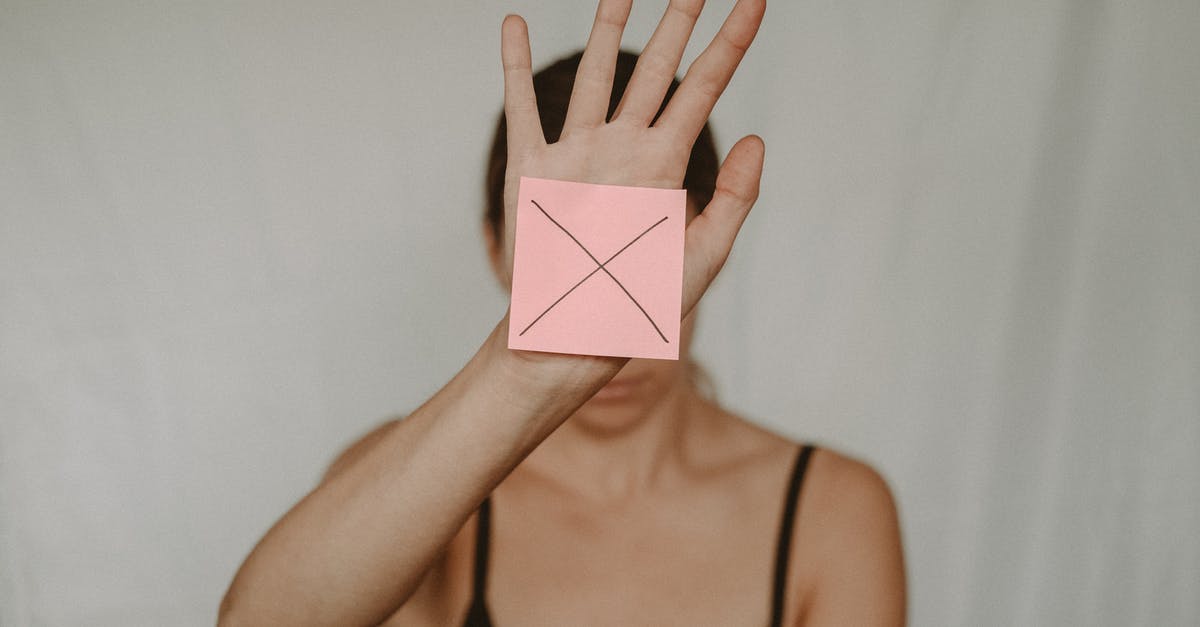Why did this roux fail? - Unrecognizable young woman demonstrating prohibition sign showing gesture of refuse using hand and note with sign stop Why did this roux fail? - Unrecognizable young woman demonstrating prohibition sign showing gesture of refuse using hand and note with sign stop